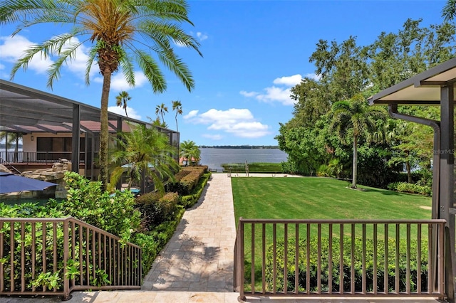 10545 Down Lakeview Cir, Windermere, FL 34786 - view of green lawn with a water view