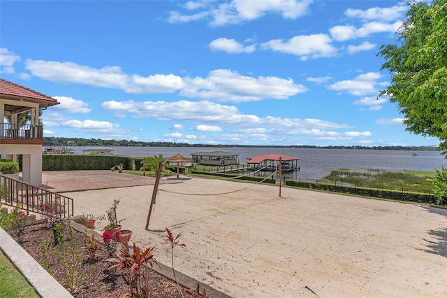 10545 Down Lakeview Cir, Windermere, FL 34786 - view of property's community with a water view and volleyball court
