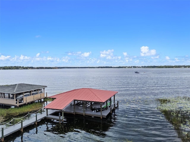 10545 Down Lakeview Cir, Windermere, FL 34786 - dock with boat lift and a water view