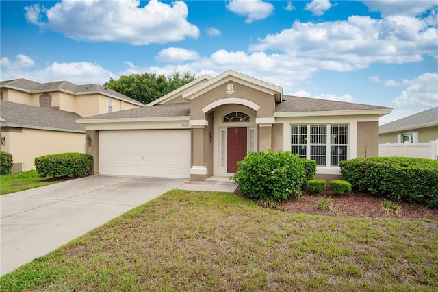 1762 Laurel Brook Loop, Casselberry, FL 32707 - single story home featuring stucco siding, a garage, and concrete driveway