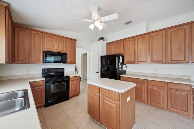 1762 Laurel Brook Loop, Casselberry, FL 32707 - kitchen featuring black appliances, arched walkways, a kitchen island, light tile patterned floors, and ceiling fan