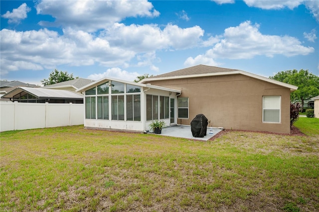 1762 Laurel Brook Loop, Casselberry, FL 32707 - rear view of house with a sunroom, a patio, and stucco siding
