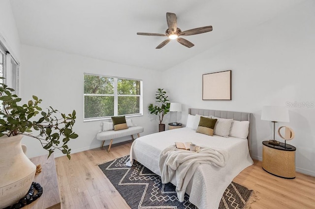 1870 Whispering Way, Tarpon Springs, FL 34689 - bedroom featuring lofted ceiling, wood finished floors, and a ceiling fan