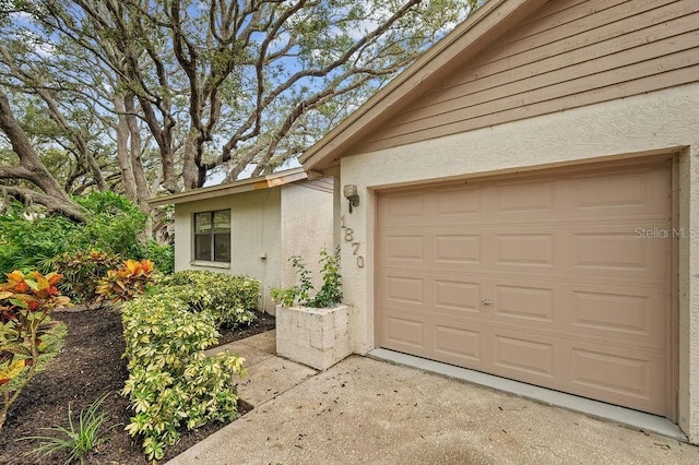 1870 Whispering Way, Tarpon Springs, FL 34689 - garage with driveway