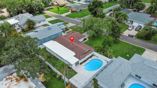 671 25th St SW, Largo, FL 33770 - aerial view of residential area with a pool area