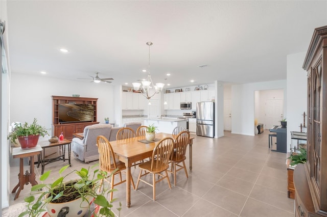 4021 Mayhill Loop, Eustis, FL 32736 - dining room featuring ceiling fan, recessed lighting, light tile patterned flooring, and a chandelier