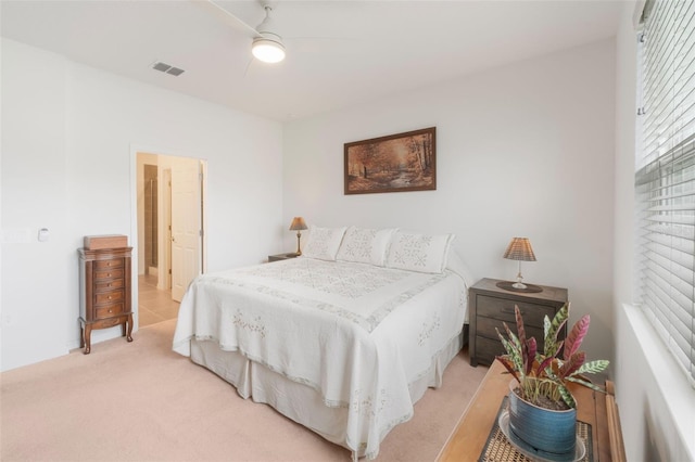 4021 Mayhill Loop, Eustis, FL 32736 - bedroom with light colored carpet and ceiling fan