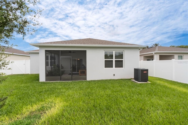 4021 Mayhill Loop, Eustis, FL 32736 - back of property with a sunroom, stucco siding, a fenced backyard, and a gate
