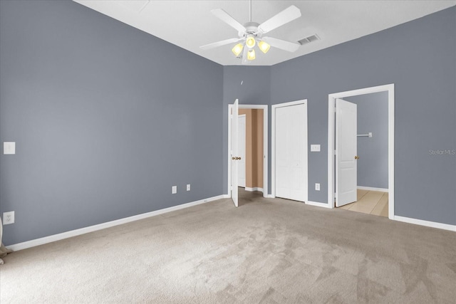 516 Brunello Dr, Davenport, FL 33897 - unfurnished bedroom with carpet and ceiling fan