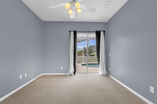 516 Brunello Dr, Davenport, FL 33897 - spare room with a ceiling fan and carpet flooring
