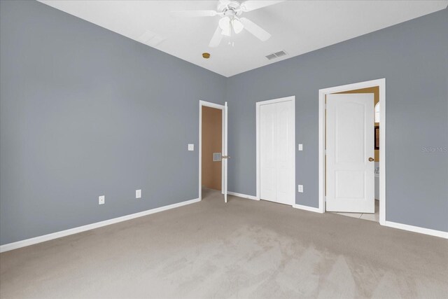 516 Brunello Dr, Davenport, FL 33897 - unfurnished bedroom with carpet floors, a ceiling fan, and a closet