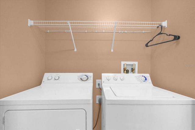 516 Brunello Dr, Davenport, FL 33897 - laundry area with washing machine and clothes dryer