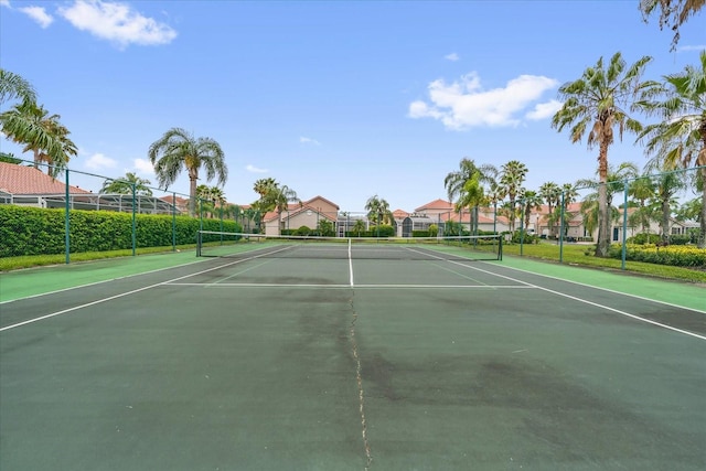 516 Brunello Dr, Davenport, FL 33897 - view of tennis court with a residential view