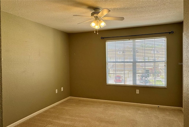 3069 Ashland Ln N, Kissimmee, FL 34741 - carpeted spare room featuring ceiling fan and a textured ceiling