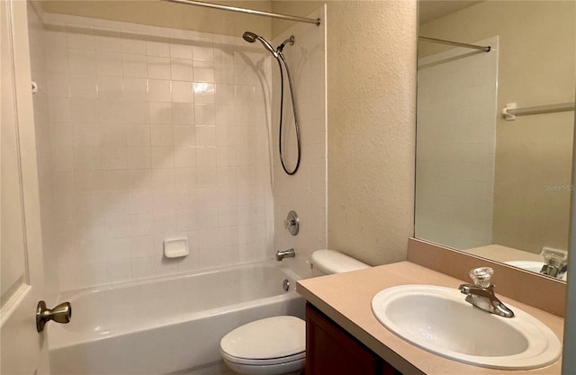 3069 Ashland Ln N, Kissimmee, FL 34741 - bathroom with vanity, shower / tub combination, and a textured wall
