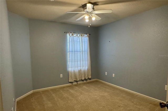 3069 Ashland Ln N, Kissimmee, FL 34741 - empty room with ceiling fan and carpet flooring