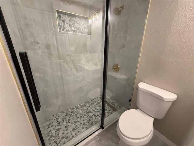 633 Flower Fields Ln, Orlando, FL 32824 - bathroom featuring toilet and a shower stall