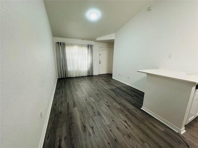 6328 Raleigh St Unit 816, Orlando, FL 32835 - unfurnished room featuring dark wood-type flooring and vaulted ceiling