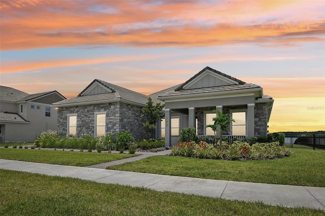 17838 Hither Hills Cir, Winter Garden, FL 34787 - view of front of house with stone siding and a tile roof