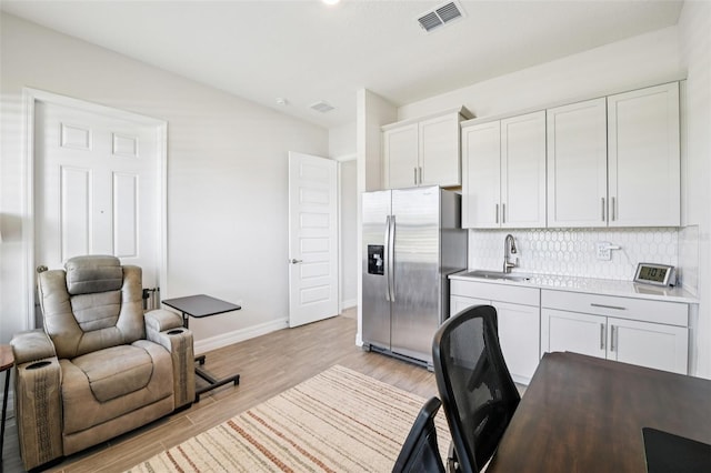 17838 Hither Hills Cir, Winter Garden, FL 34787 - office area with a sink and light wood-type flooring