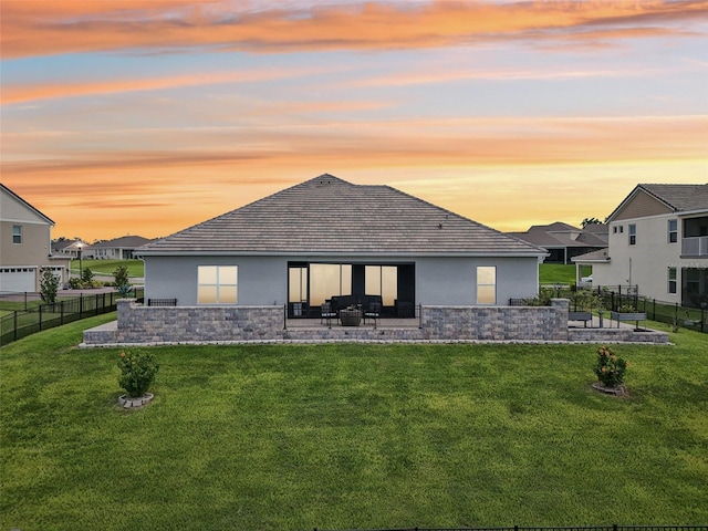 17838 Hither Hills Cir, Winter Garden, FL 34787 - back of property with stucco siding, a patio, and stone siding