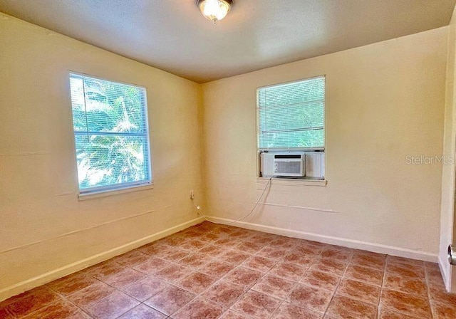 316AND318 Bay Ave, Cocoa, FL 32922 - unfurnished room featuring cooling unit and light tile patterned floors