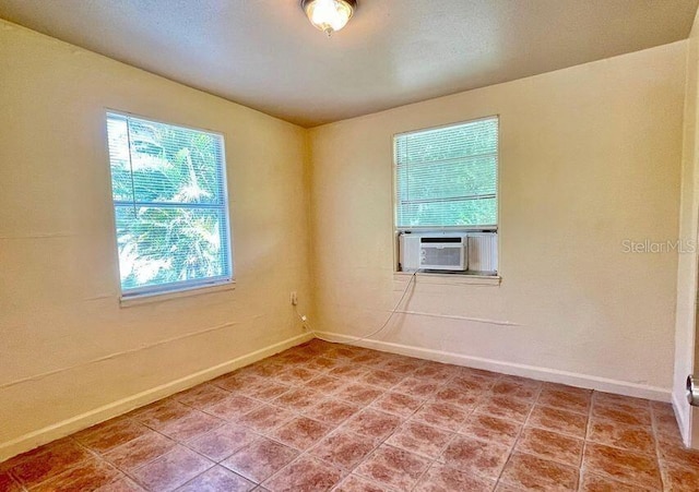 316AND318 Bay Ave, Cocoa, FL 32922 - unfurnished room with baseboards and cooling unit