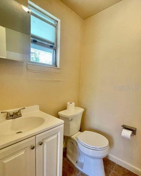 316AND318 Bay Ave, Cocoa, FL 32922 - half bathroom with vanity and tile patterned floors