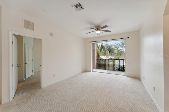 1355 Venezia Ct Unit 201, Davenport, FL 33896 - spare room with ceiling fan and light carpet