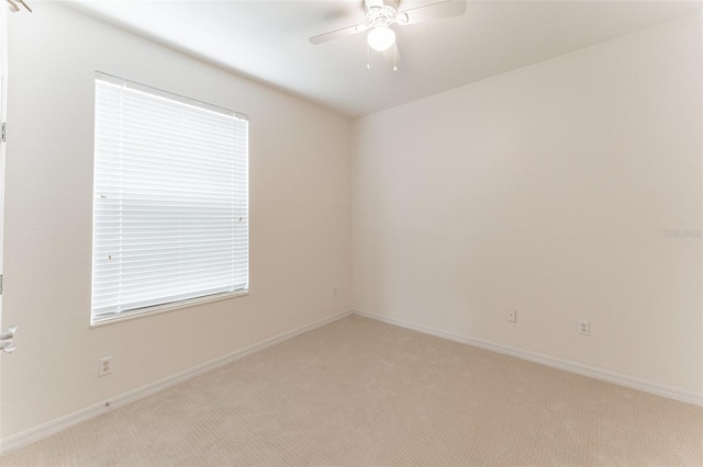 1355 Venezia Ct Unit 201, Davenport, FL 33896 - unfurnished room featuring light colored carpet and a ceiling fan