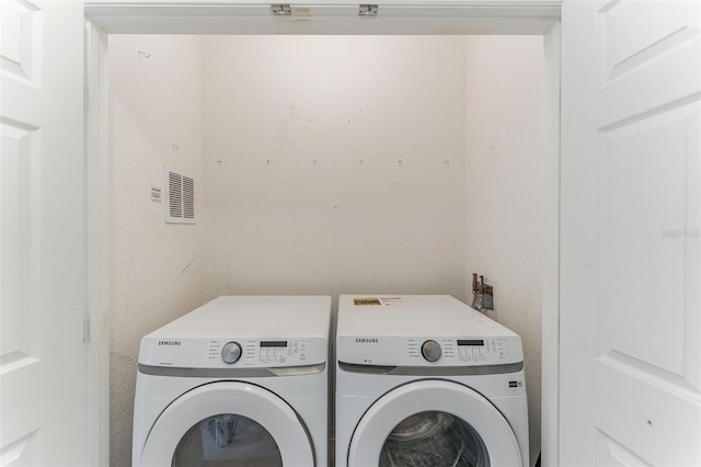 1355 Venezia Ct Unit 201, Davenport, FL 33896 - washroom featuring separate washer and dryer