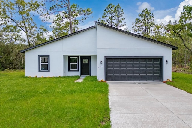 9312 N Akola Way, Citrus Springs, FL 34434 - contemporary home featuring an attached garage, a front lawn, driveway, and stucco siding