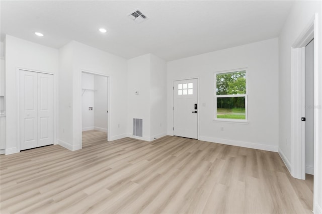 9312 N Akola Way, Citrus Springs, FL 34434 - foyer entrance with light wood-type flooring and recessed lighting