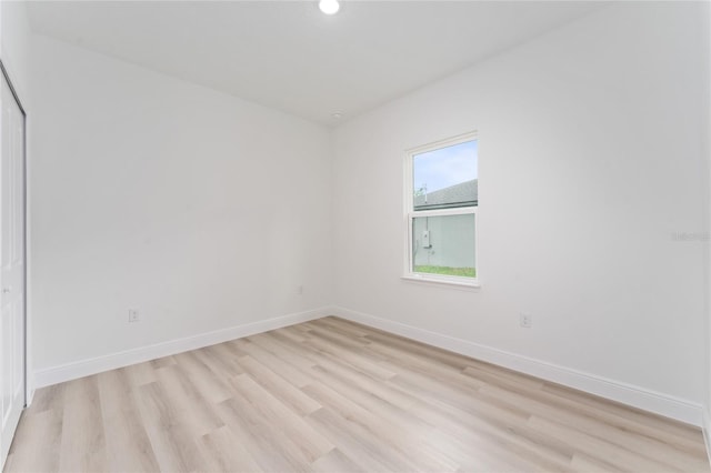 9312 N Akola Way, Citrus Springs, FL 34434 - unfurnished room with light wood-style floors and recessed lighting