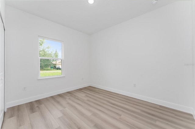 9312 N Akola Way, Citrus Springs, FL 34434 - empty room featuring light wood-style flooring and recessed lighting