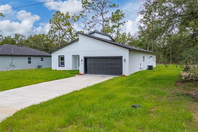 9312 N Akola Way, Citrus Springs, FL 34434 - view of front of property featuring stucco siding, driveway, a garage, and a front yard