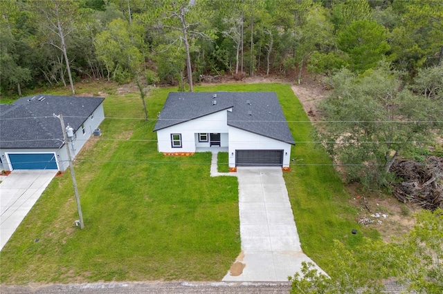 9312 N Akola Way, Citrus Springs, FL 34434 - aerial view of property and surrounding area with a heavily wooded area