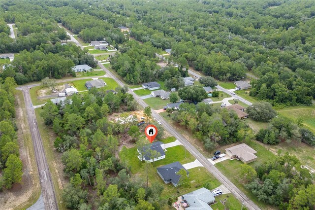 9312 N Akola Way, Citrus Springs, FL 34434 - aerial view of residential area with a forest