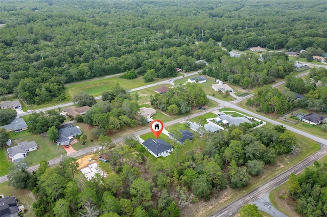 9312 N Akola Way, Citrus Springs, FL 34434 - aerial overview of property's location featuring a heavily wooded area