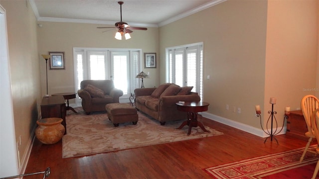 1144 Delaney Ave Unit 1144, Orlando, FL 32806 - living area featuring ceiling fan, wood finished floors, and ornamental molding