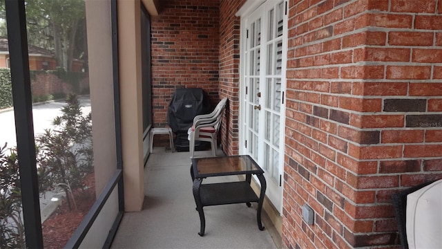 1144 Delaney Ave Unit 1144, Orlando, FL 32806 - sunroom / solarium featuring french doors