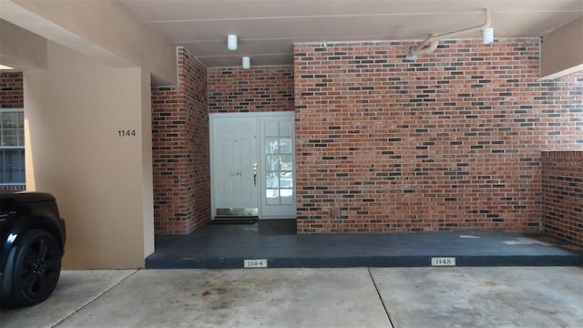 1144 Delaney Ave Unit 1144, Orlando, FL 32806 - property entrance with brick siding