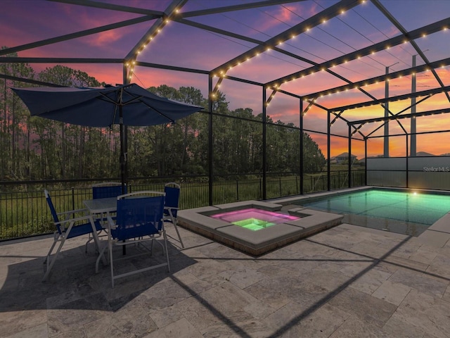 2452 Camden Park Ave, Davenport, FL 33837 - view of pool featuring a patio, a pool with connected hot tub, and glass enclosure