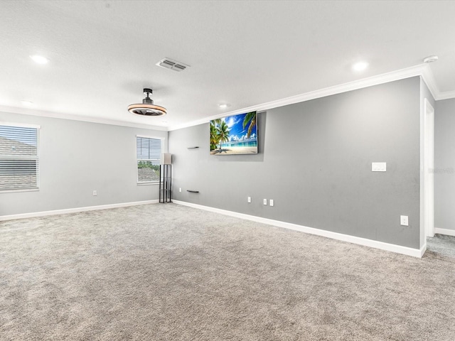 2452 Camden Park Ave, Davenport, FL 33837 - empty room featuring crown molding, carpet, and recessed lighting