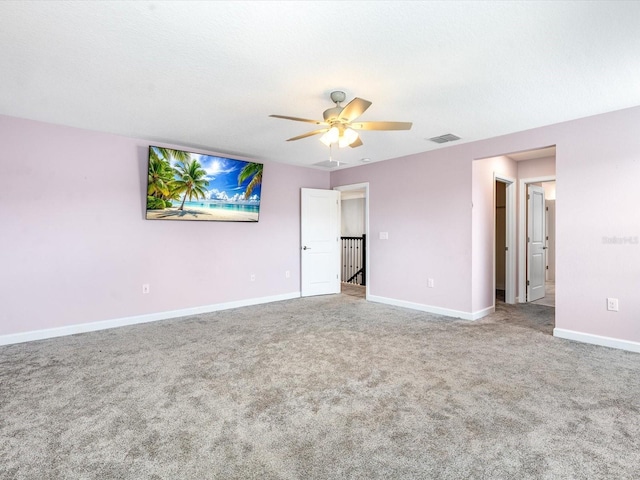 2452 Camden Park Ave, Davenport, FL 33837 - unfurnished bedroom with carpet and a ceiling fan