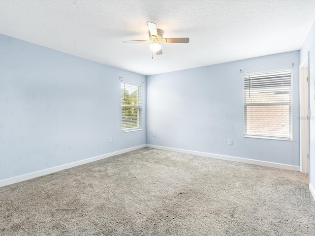 2452 Camden Park Ave, Davenport, FL 33837 - carpeted spare room featuring ceiling fan and a textured ceiling