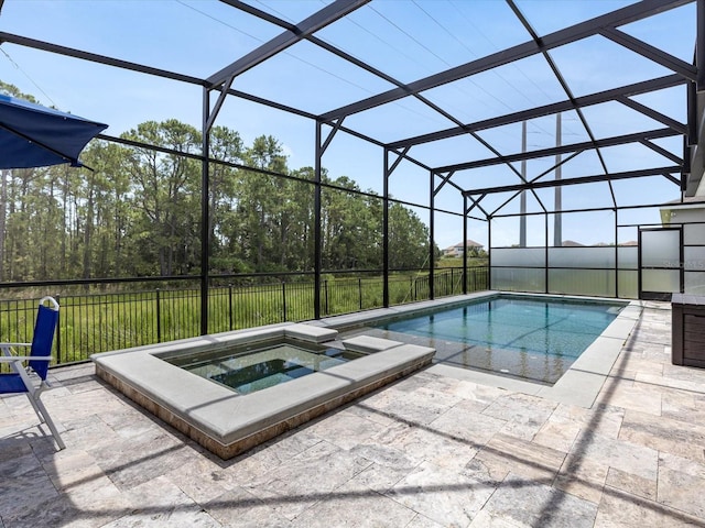 2452 Camden Park Ave, Davenport, FL 33837 - view of swimming pool with a pool with connected hot tub, a lanai, and a patio
