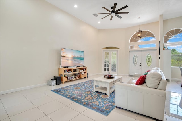 18852 Starry St, Orlando, FL 32833 - tiled living area featuring ceiling fan, recessed lighting, and a high ceiling
