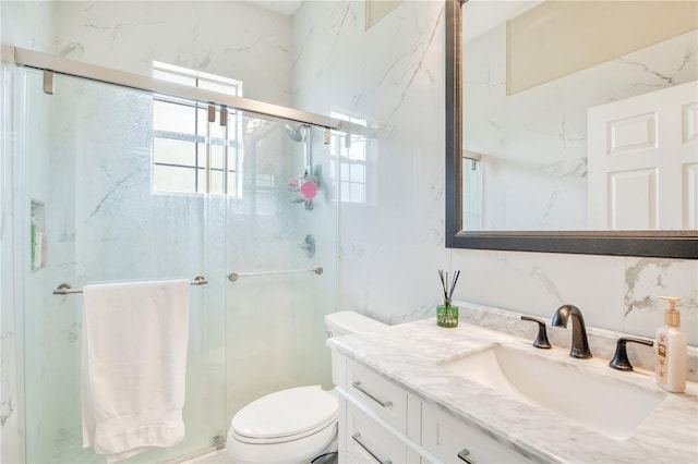 18852 Starry St, Orlando, FL 32833 - bathroom with tile walls, vanity, and a marble finish shower