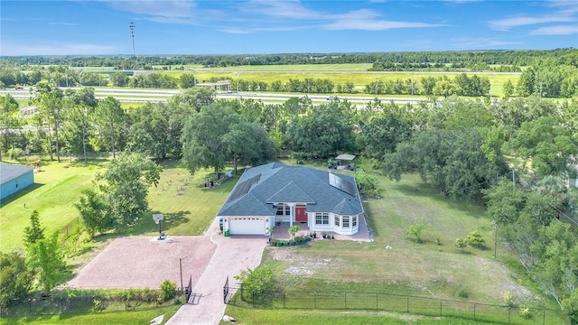 18852 Starry St, Orlando, FL 32833 - aerial view of property and surrounding area with a tree filled landscape